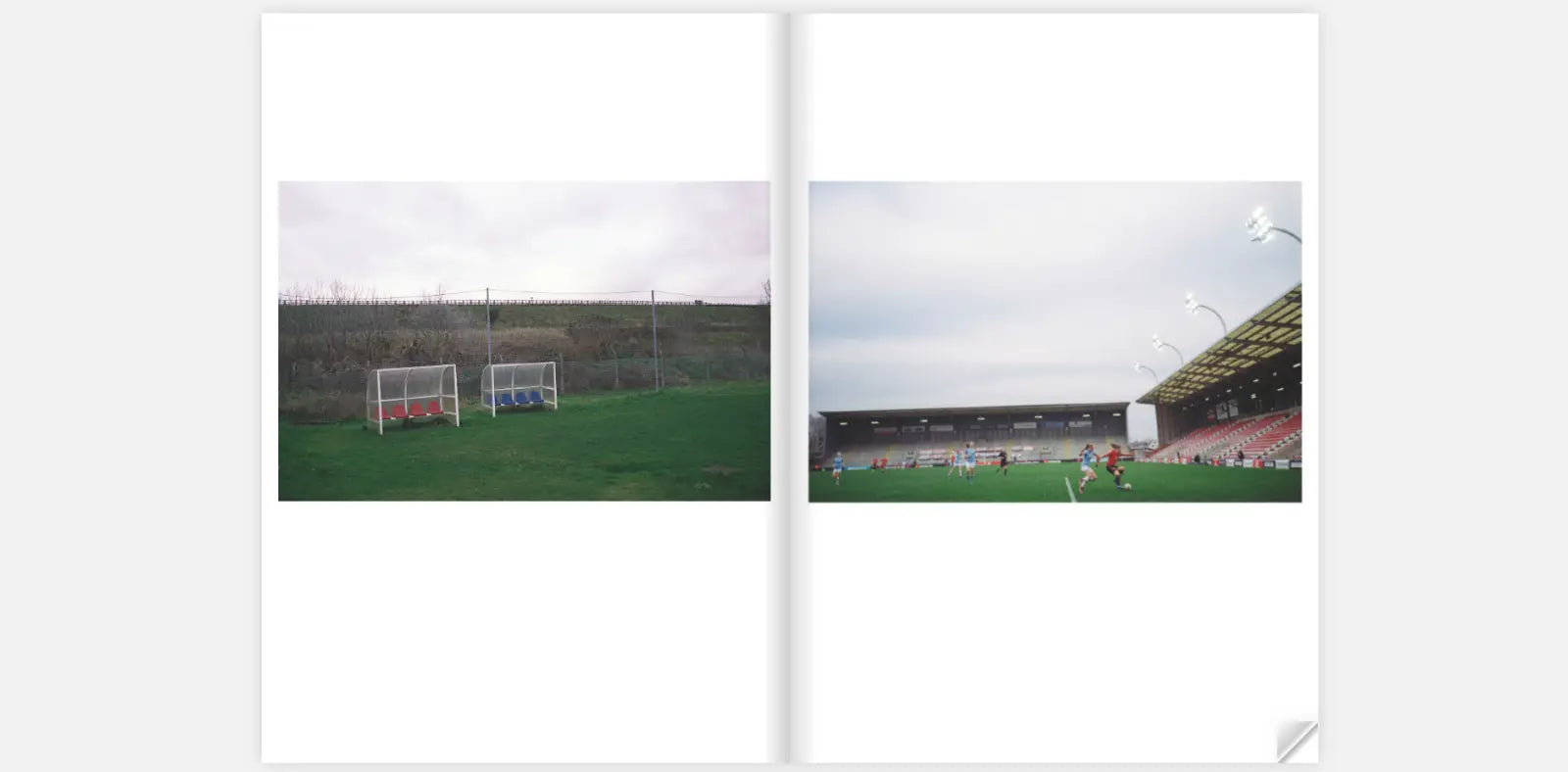 Two-page spread from the zine "The Women's Game" by Claire Wray. The left page features two empty football dugouts with red and blue seats on a grassy field, set against a background of a hillside and a fence. The right page shows a football match in progress at a stadium, with players in action on the field and a partially filled stand with red seats and overhead lights.